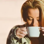 Woman drinking coffee from the best Cafes in Murray Bridge